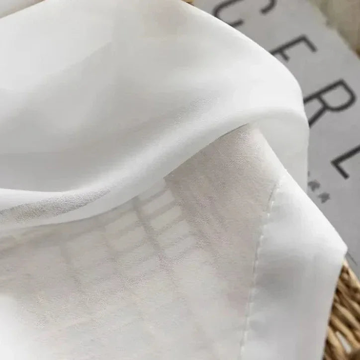 Cortina Voil Translúcida Branca com Ilhós Silenciosos Lenogue